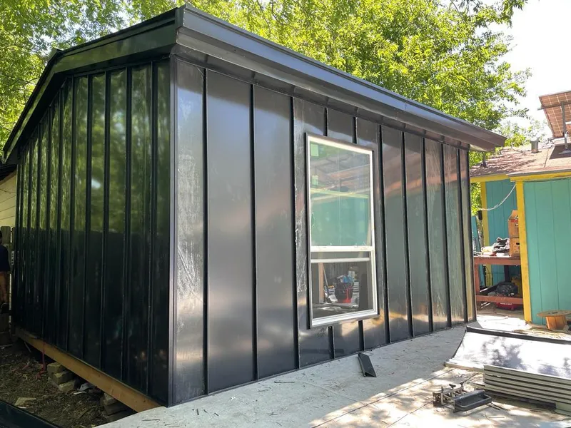 Black standing seam metal wall panels for Metal Roof Installation in Elko