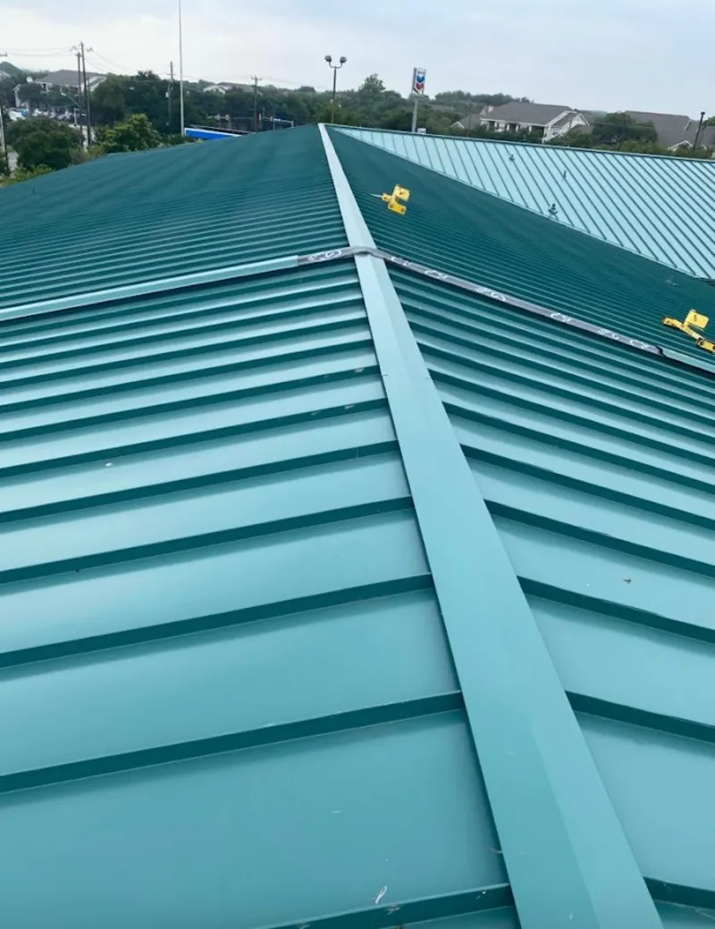 Green commercial metal roof ridge and valley for Metal Roof Repair in Elko