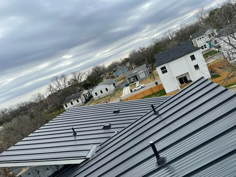 Standing seam metal roof panels with vents for Skylight Repair in Elko